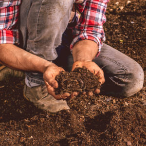 man holding dirt